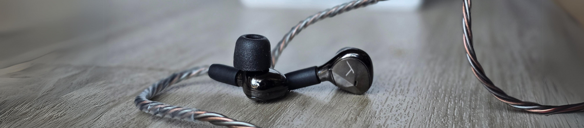 Women loving her comply tips with her earbuds